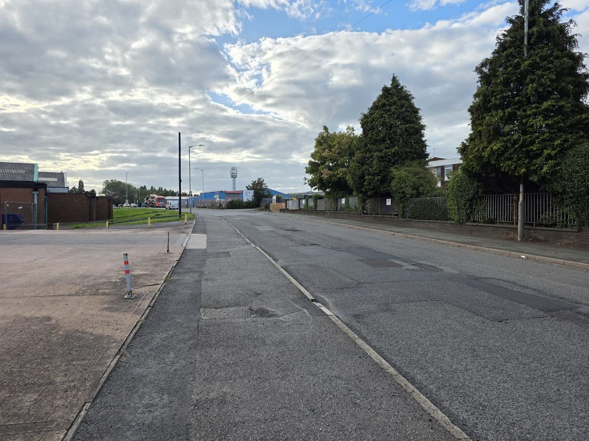 Suburban Road Under Morning Cloud